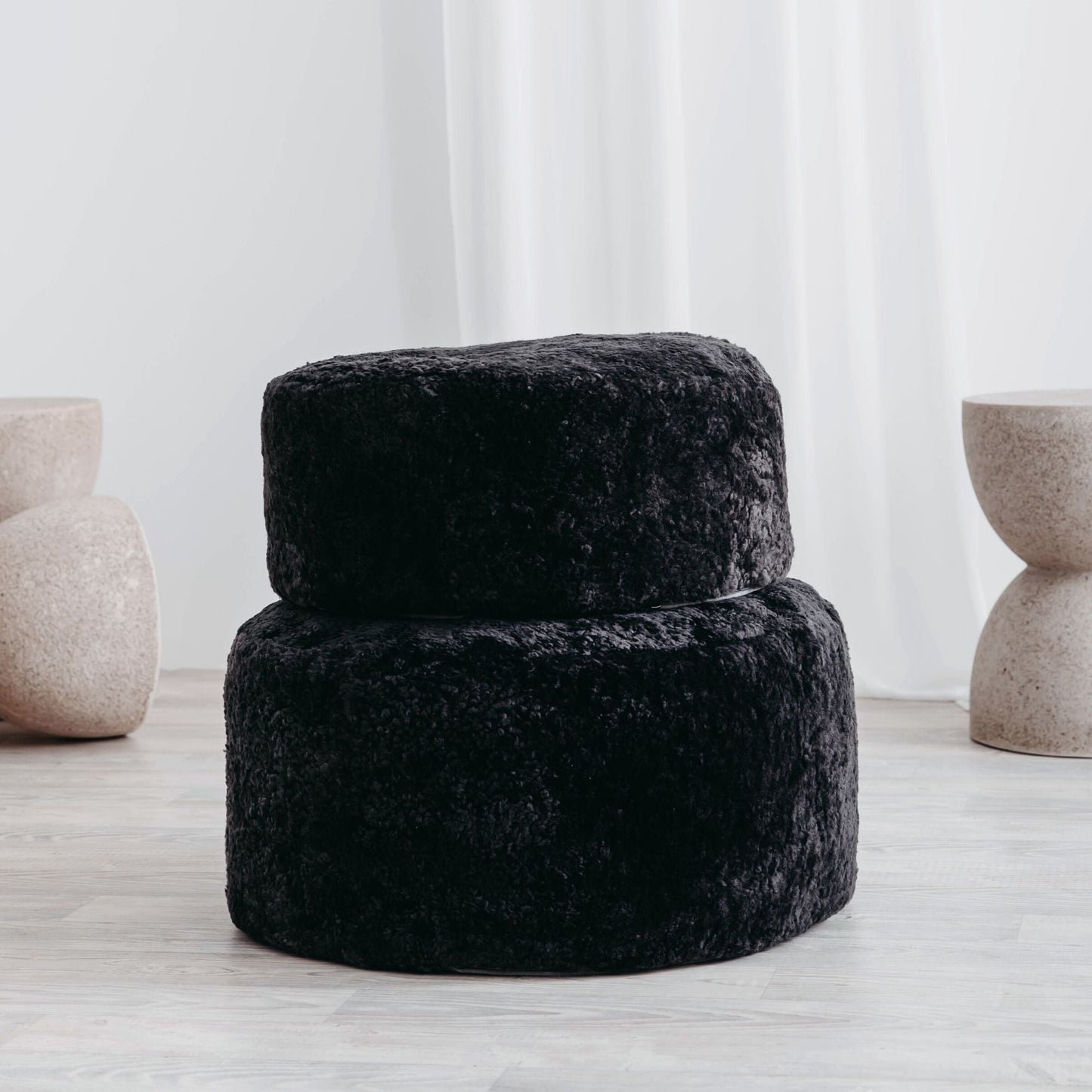 Round sheepskin ottoman in Ash by HUXFORD GROVE