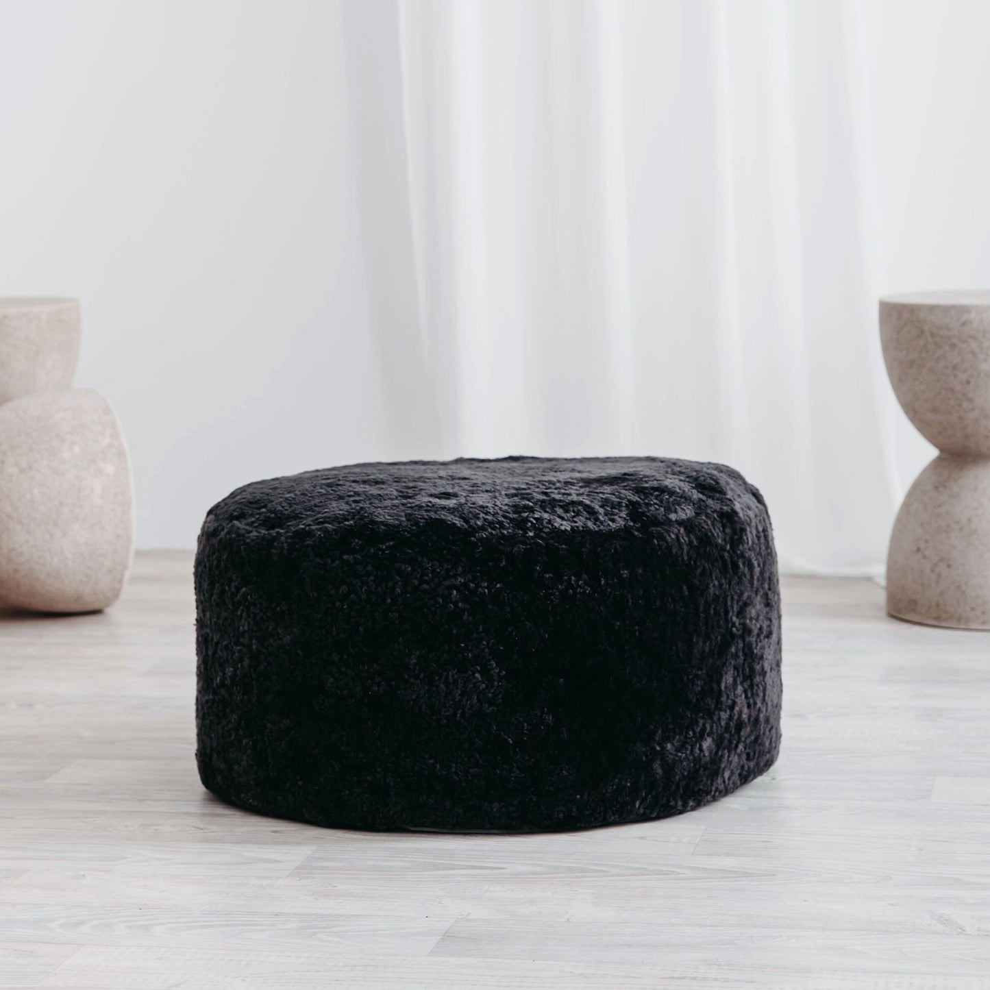 Round sheepskin ottoman in Ash by HUXFORD GROVE 3